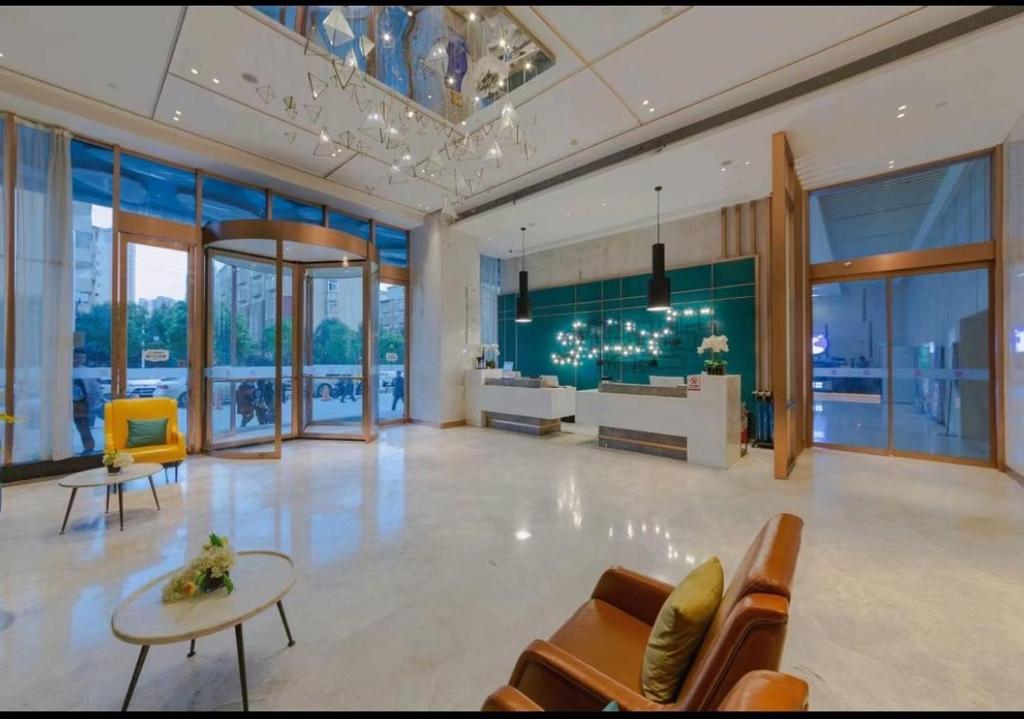 Posezení v ubytování Echarm Hotel Wuhan Hanyang Wangjiawan Sixin Avenue Metro Station