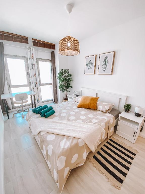 Postel nebo postele na pokoji v ubytování Summer Breeze Apartment