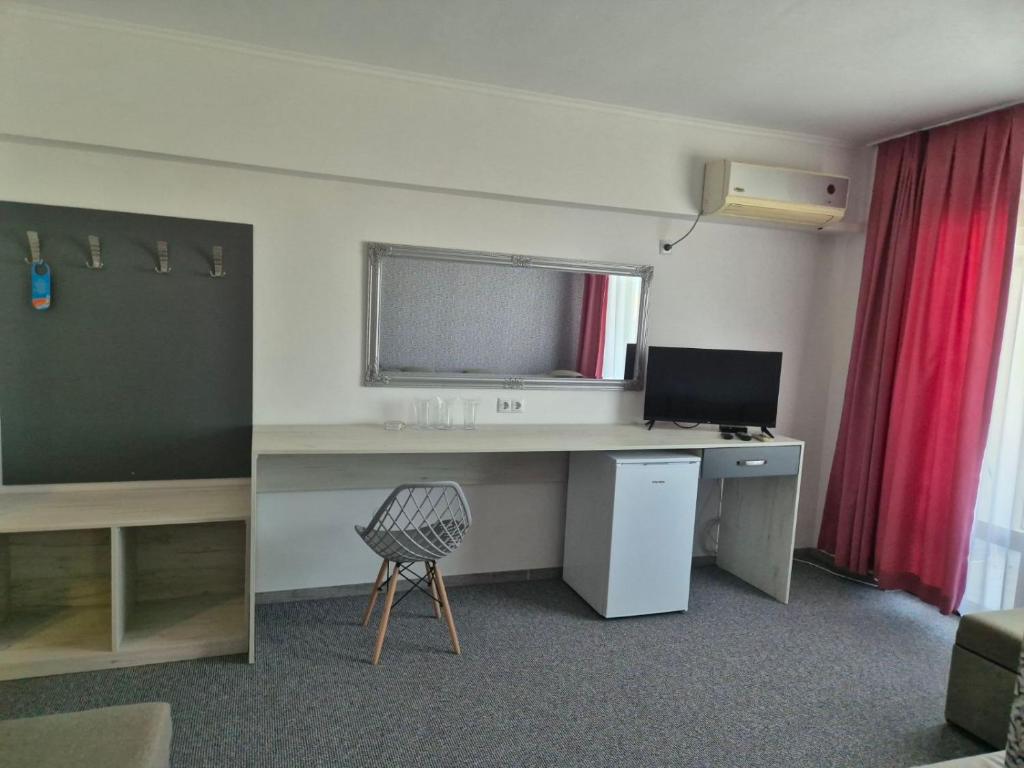 TV a/nebo společenská místnost v ubytování Dani beach Sozopol