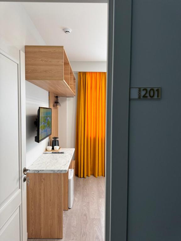 Kuchyň nebo kuchyňský kout v ubytování Hotel Boutique Adam