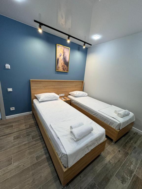 Postel nebo postele na pokoji v ubytování Hotel Boutique Adam