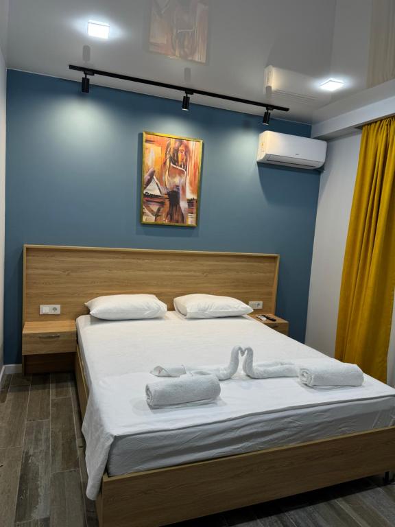 Postel nebo postele na pokoji v ubytování Hotel Boutique Adam