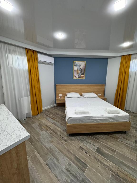 Postel nebo postele na pokoji v ubytování Hotel Boutique Adam