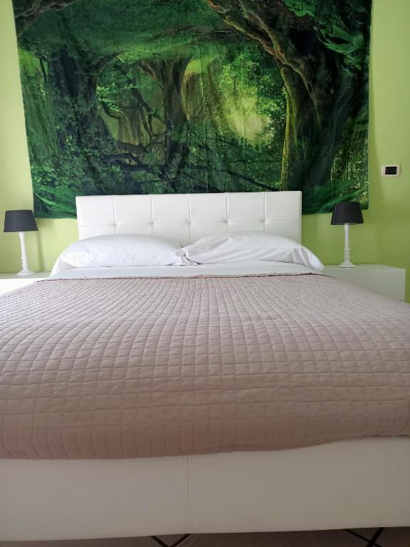 Łóżko lub łóżka w pokoju w obiekcie Pasubio House Intero appartamento