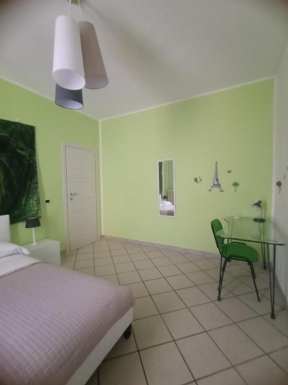 Łóżko lub łóżka w pokoju w obiekcie Pasubio House Intero appartamento