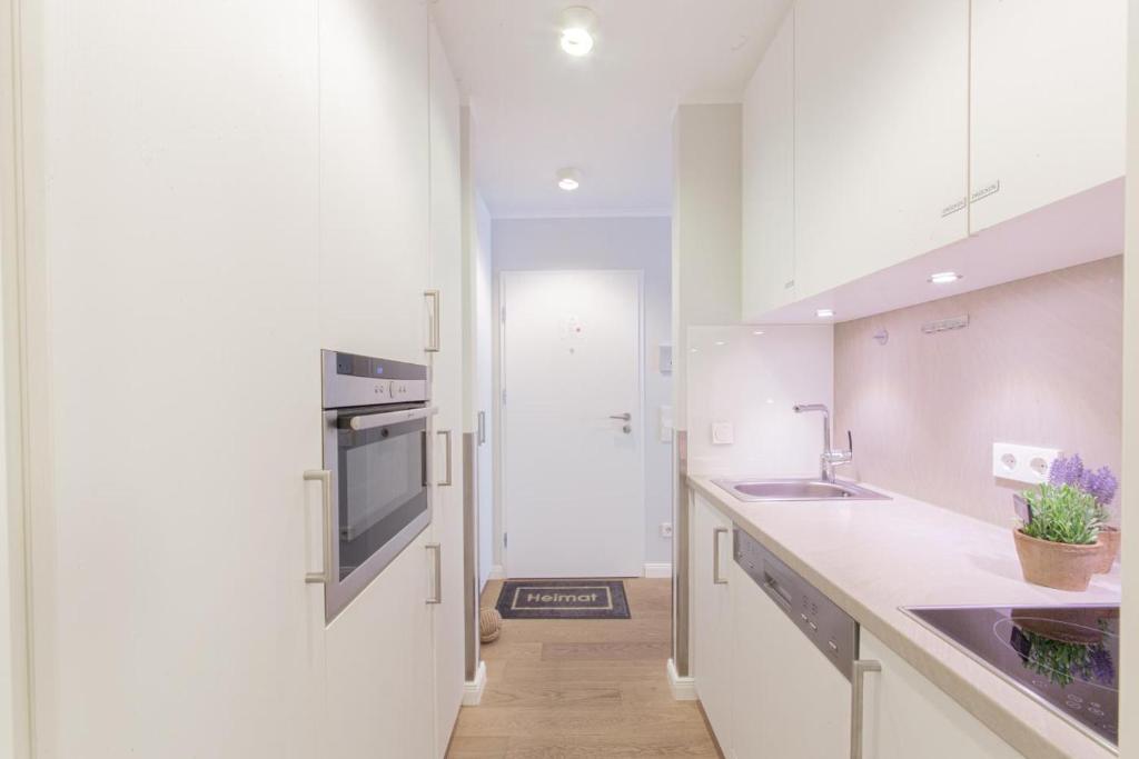 Kuchyň nebo kuchyňský kout v ubytování Ferienwohnung 30 Grad