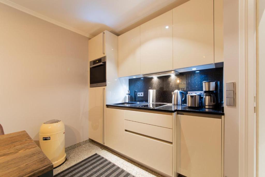 Kuchyň nebo kuchyňský kout v ubytování Ferienwohnung Timm's - Timmendorfer Strand