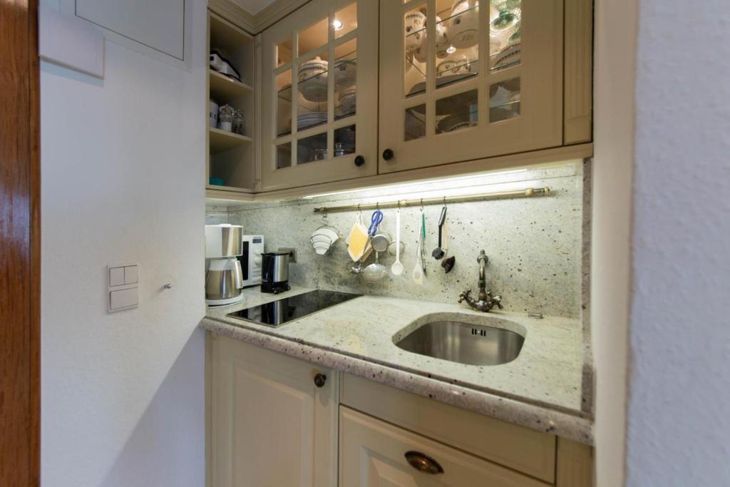 Kuchyň nebo kuchyňský kout v ubytování Ferienwohnung Residenz App 809 - Timmendorfer Strand