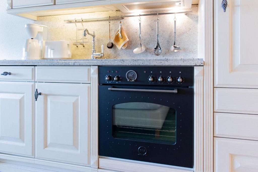 Kuchyň nebo kuchyňský kout v ubytování Ferienwohnung Residenz App 812 - Timmendorfer Strand