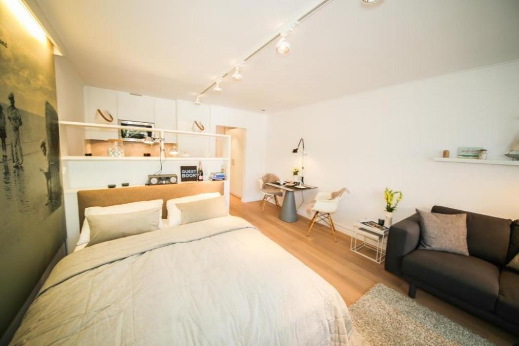 Postel nebo postele na pokoji v ubytování Ferienwohnung Am Strand