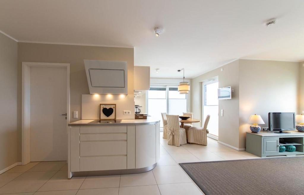 Kuchyň nebo kuchyňský kout v ubytování Ferienwohnung Beach 66 in Haffkrug