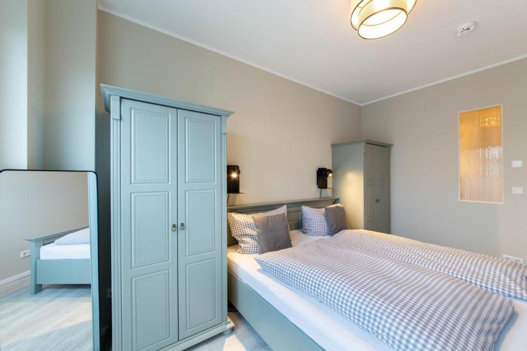 Postel nebo postele na pokoji v ubytování Ferienwohnung Beach 66 in Haffkrug