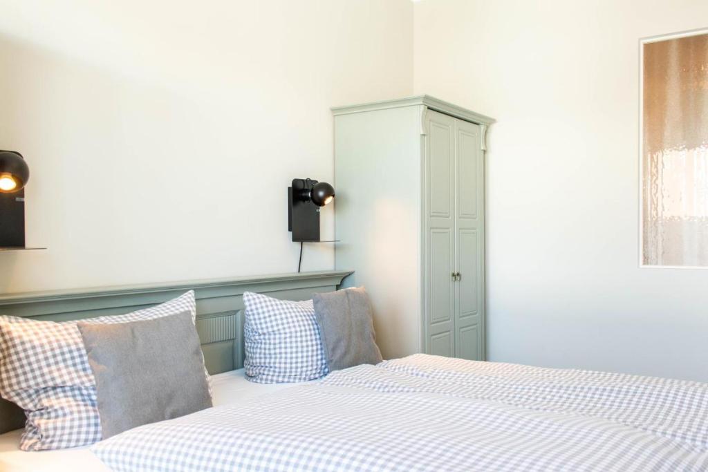 Postel nebo postele na pokoji v ubytování Ferienwohnung Beach 66 in Haffkrug