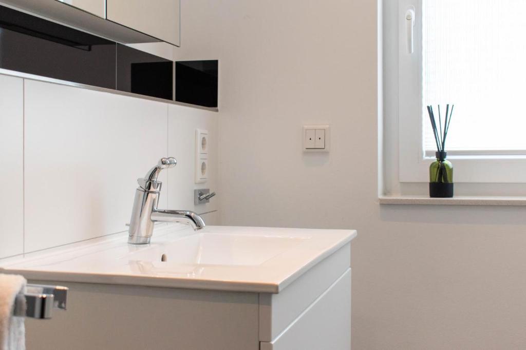 Kuchyň nebo kuchyňský kout v ubytování Ferienwohnung Beach 66 in Haffkrug