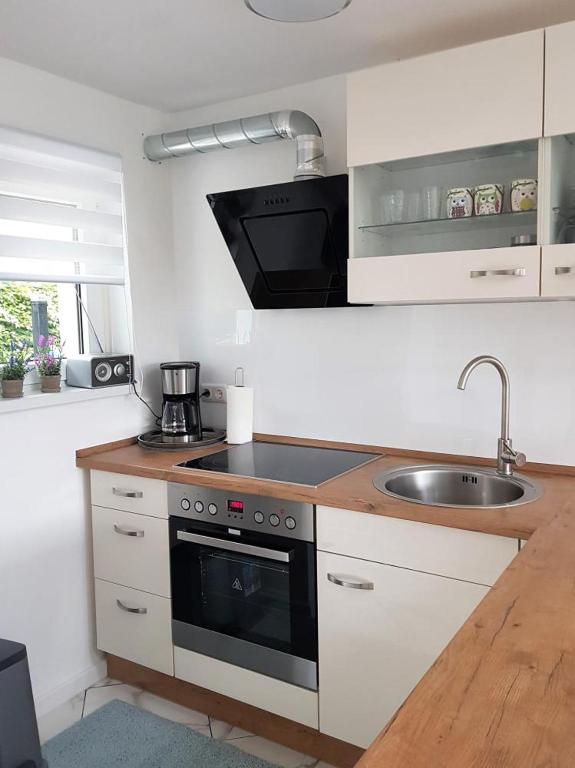 Kuchyň nebo kuchyňský kout v ubytování Ferienhaus Carl