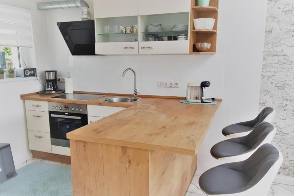 Kuchyň nebo kuchyňský kout v ubytování Ferienhaus Carl