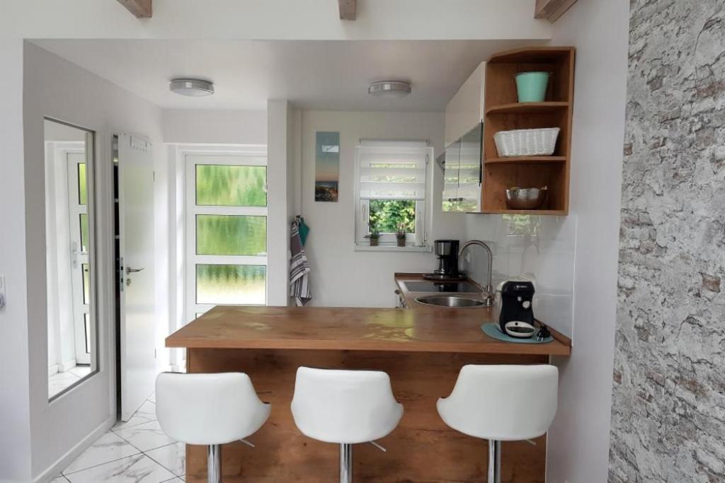 Kuchyň nebo kuchyňský kout v ubytování Ferienhaus Carl