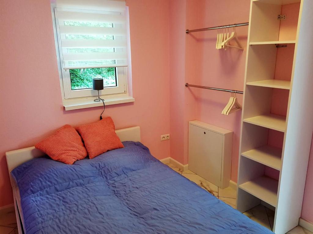 Postel nebo postele na pokoji v ubytování Ferienhaus Carl