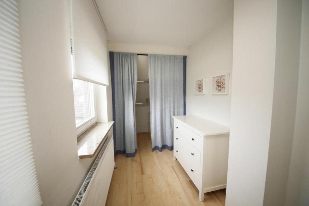 Postel nebo postele na pokoji v ubytování Ferienhaus Strandräuber