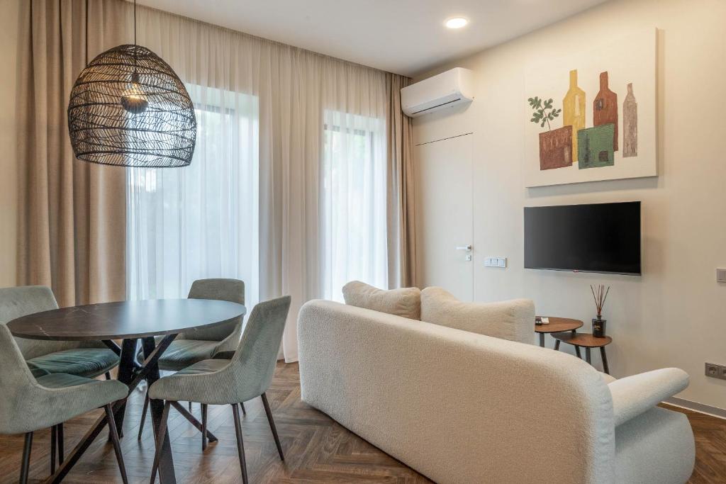 Et tv og/eller underholdning på GREEN HOUSE Downtown Apartments with private FREE parking and BIKE storage