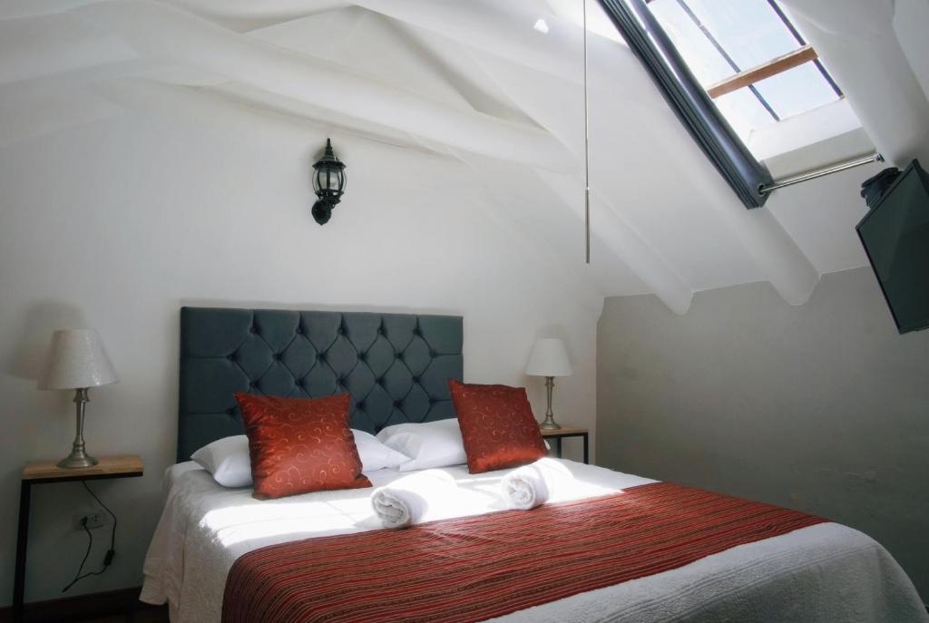 Postel nebo postele na pokoji v ubytování Kori Gems Inn