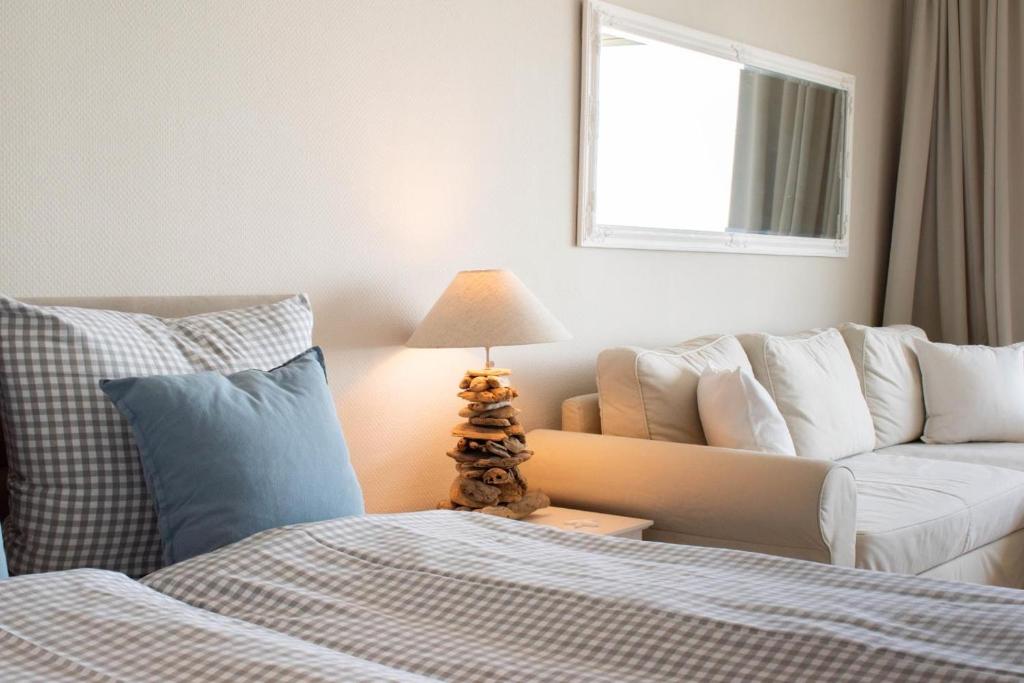 Postel nebo postele na pokoji v ubytování Ferienwohnung Residenz App 149 - Timmendorfer Strand