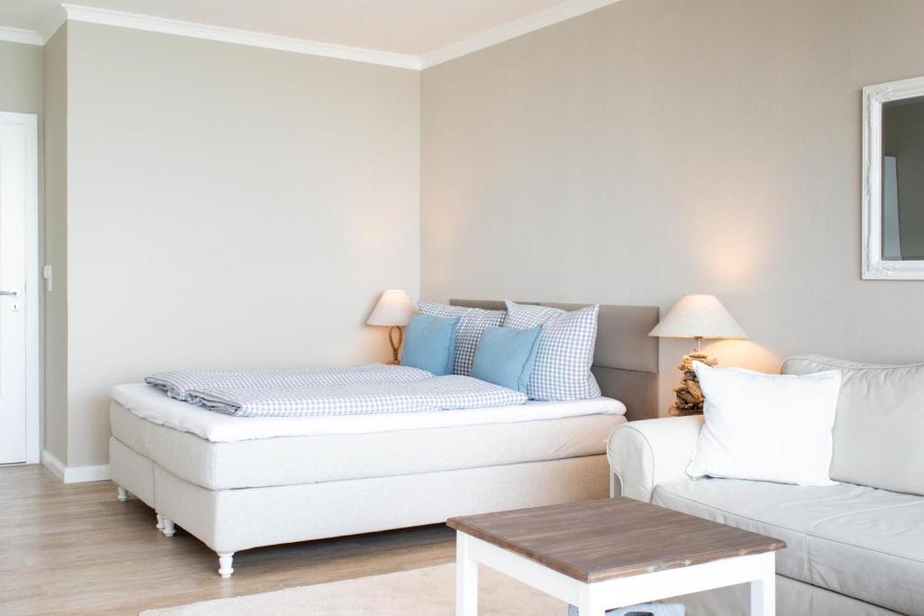 Postel nebo postele na pokoji v ubytování Ferienwohnung Residenz App 149 - Timmendorfer Strand