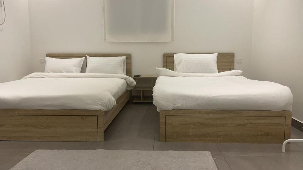 Postel nebo postele na pokoji v ubytování LADAN APARTMENT
