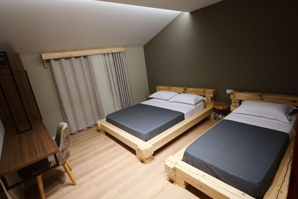 Postel nebo postele na pokoji v ubytování Hotel Ikona