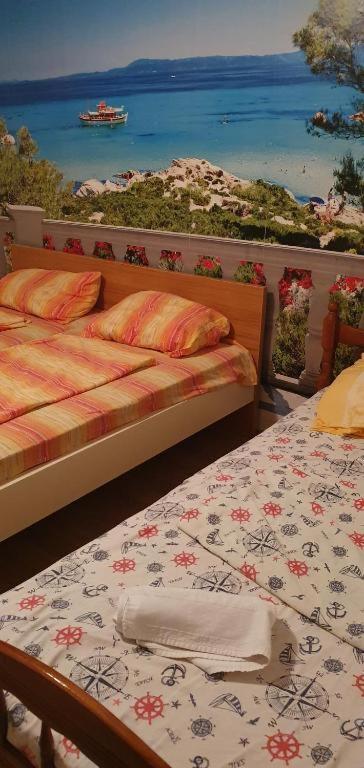 Posteľ alebo postele v izbe v ubytovaní Apartmen Kuca za odmor i familiju