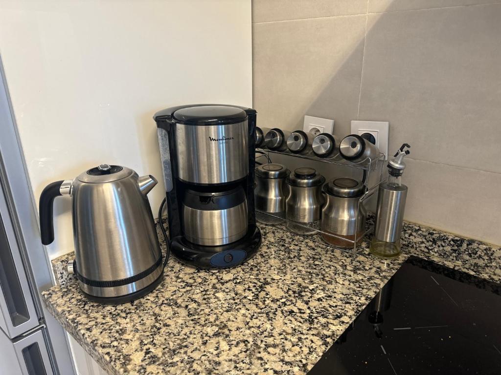 a coffee maker on a counter in a kitchen at Luxury apartment near TGV station and the beach in Tangier
