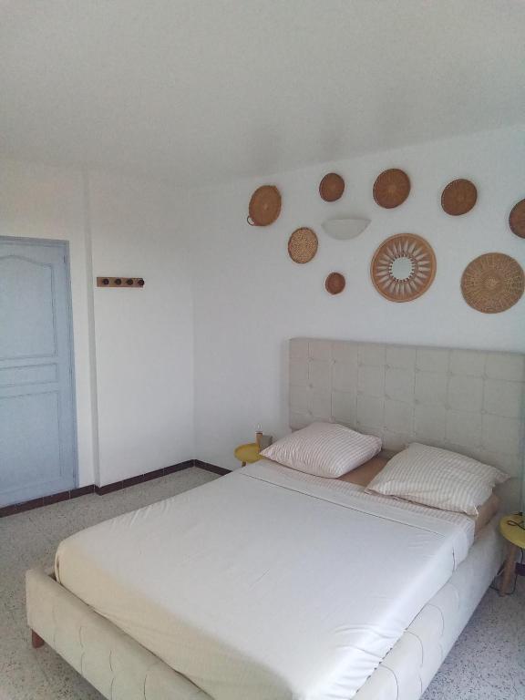Postel nebo postele na pokoji v ubytování Ogooué appartement entier Lumineux 94m2 maxi 6 couchage 3 chambres