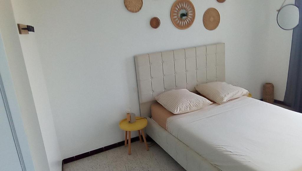 Postel nebo postele na pokoji v ubytování Ogooué appartement entier Lumineux 94m2 maxi 6 couchage 3 chambres