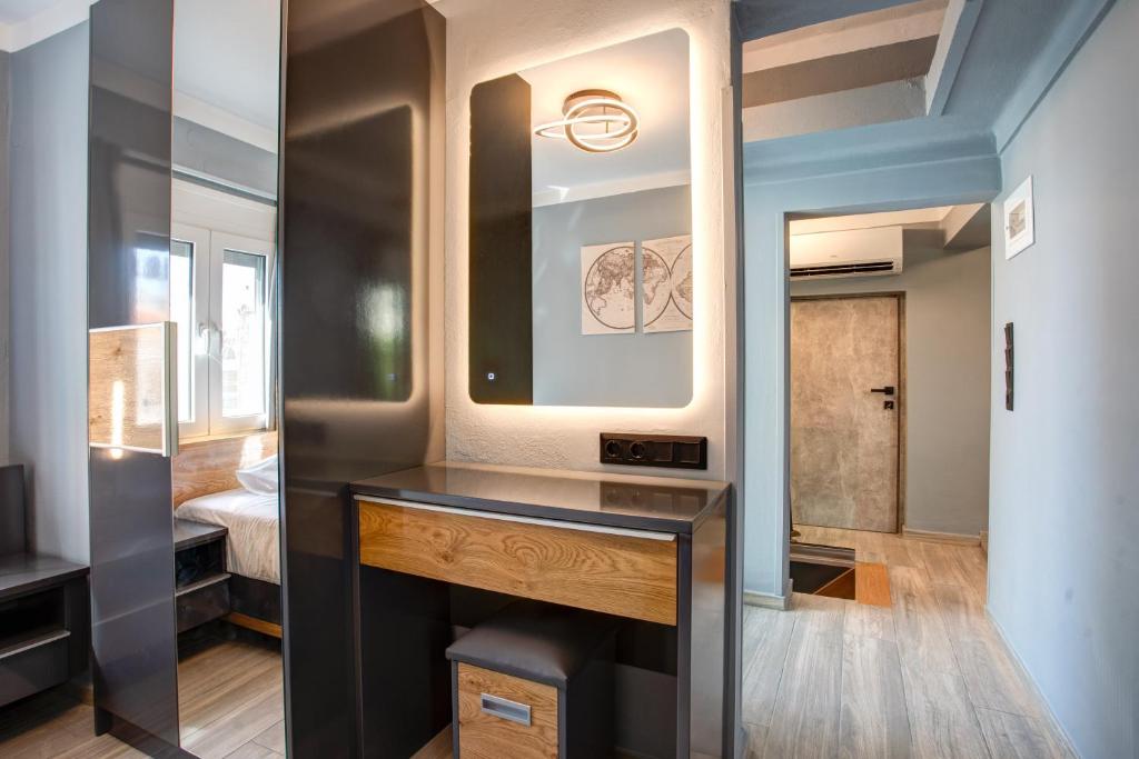 Postel nebo postele na pokoji v ubytování Agora Apartments