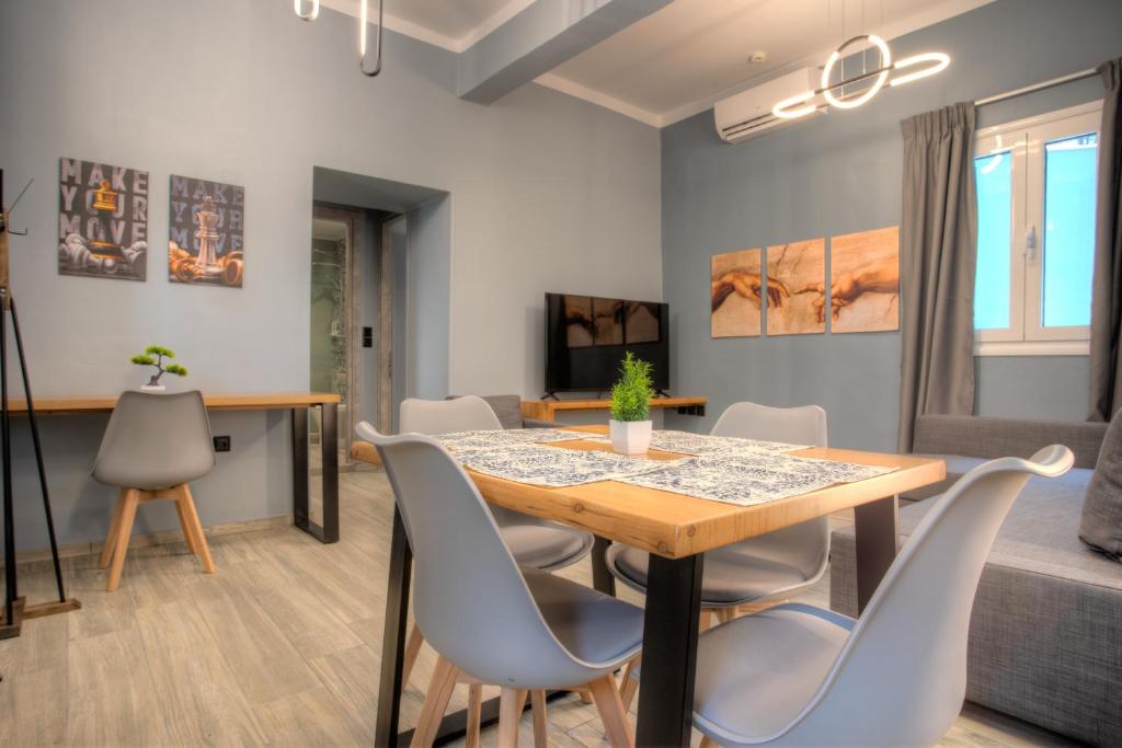 TV a/nebo společenská místnost v ubytování Agora Apartments