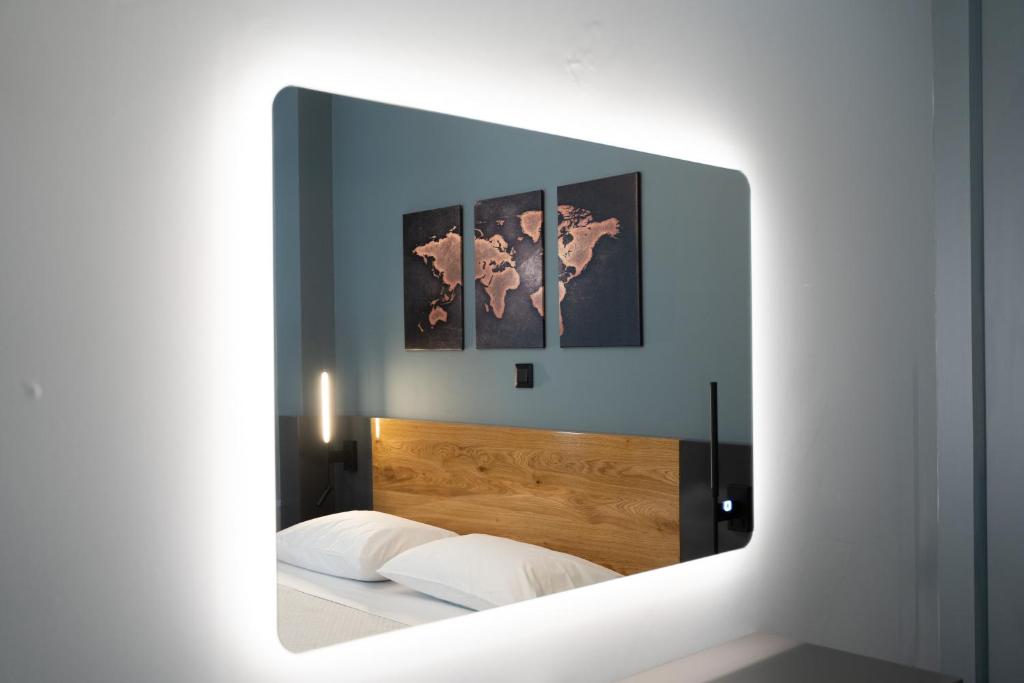 Postel nebo postele na pokoji v ubytování Agora Apartments