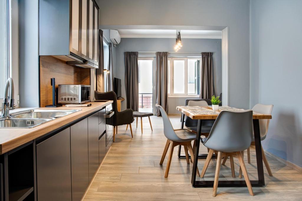 Kuchyň nebo kuchyňský kout v ubytování Agora Apartments