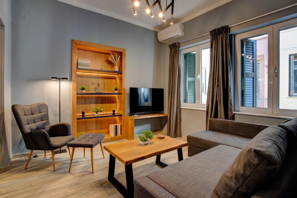TV a/nebo společenská místnost v ubytování Agora Apartments
