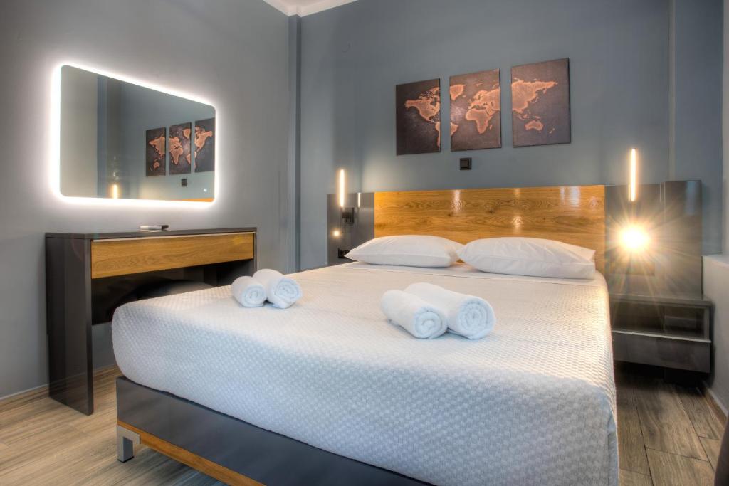 Postel nebo postele na pokoji v ubytování Agora Apartments