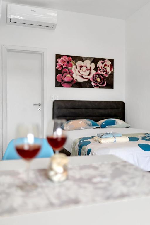 Postel nebo postele na pokoji v ubytování Casa Del Porto - Vis