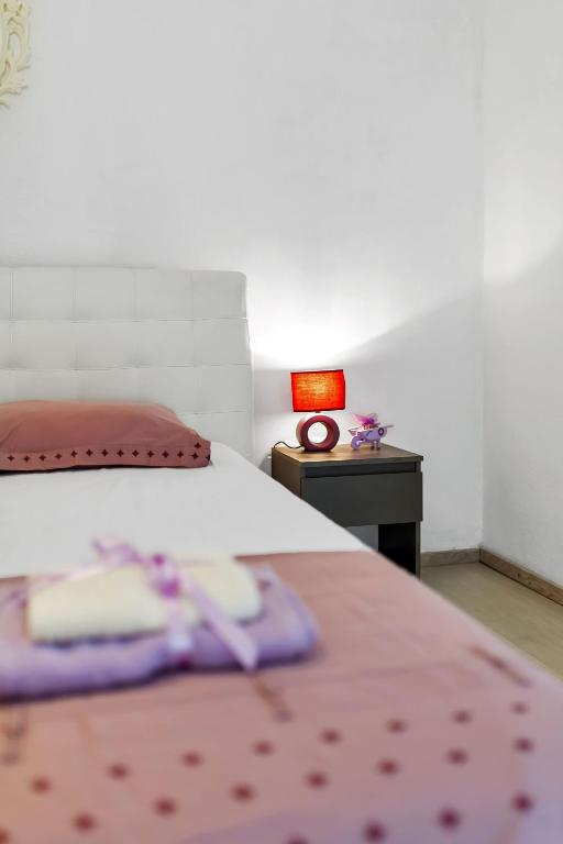 Postel nebo postele na pokoji v ubytování Casa Del Porto - Vis