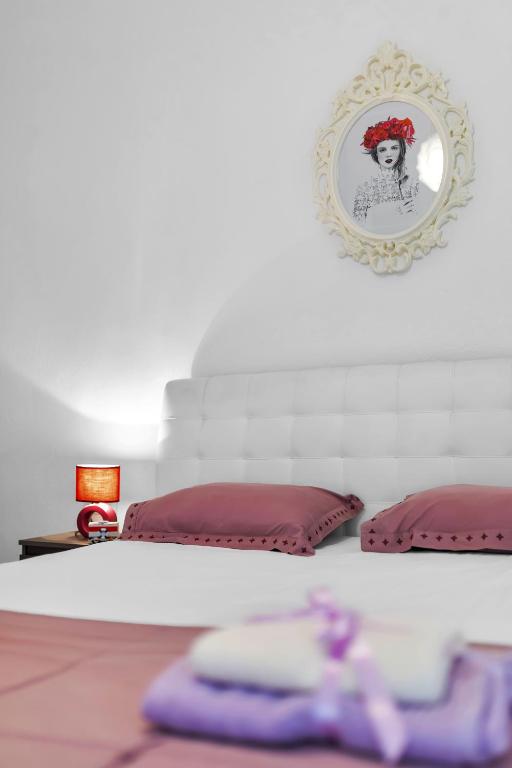 Postel nebo postele na pokoji v ubytování Casa Del Porto - Vis