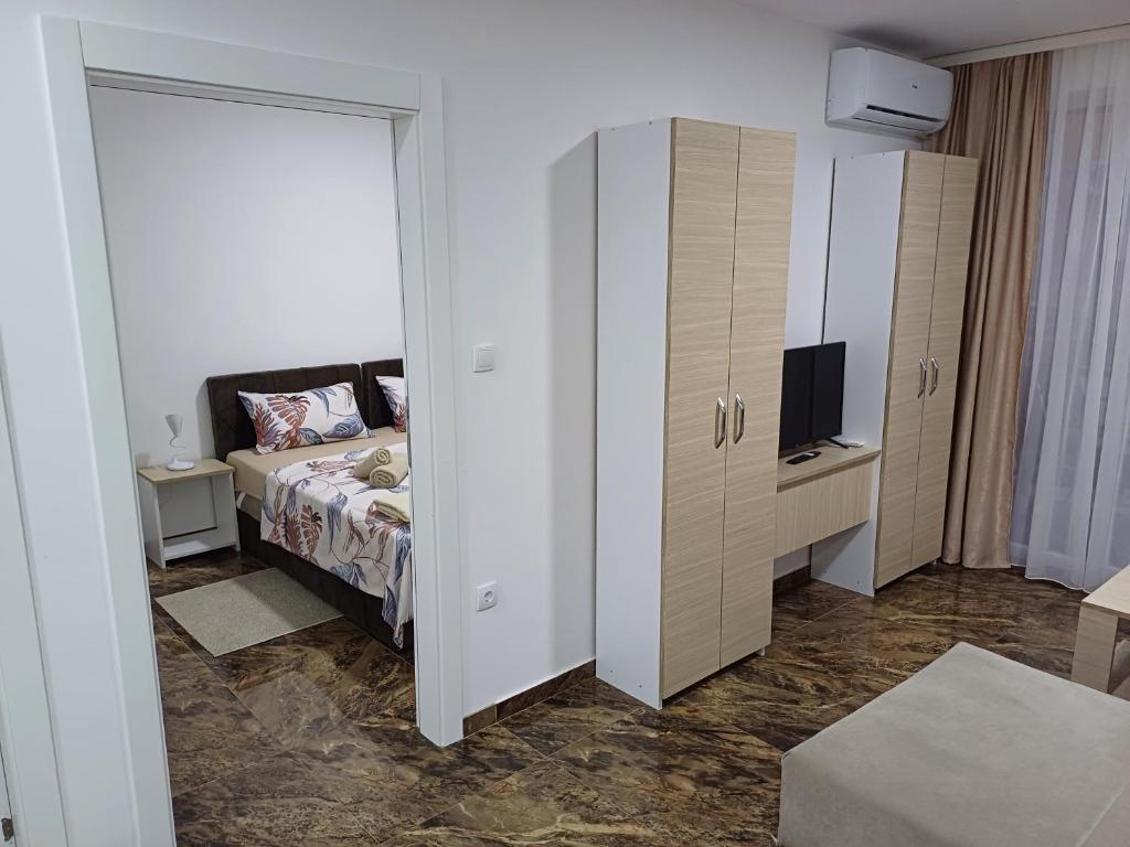Postel nebo postele na pokoji v ubytování Prenoćište SILVER LUX Srebrno Jezero