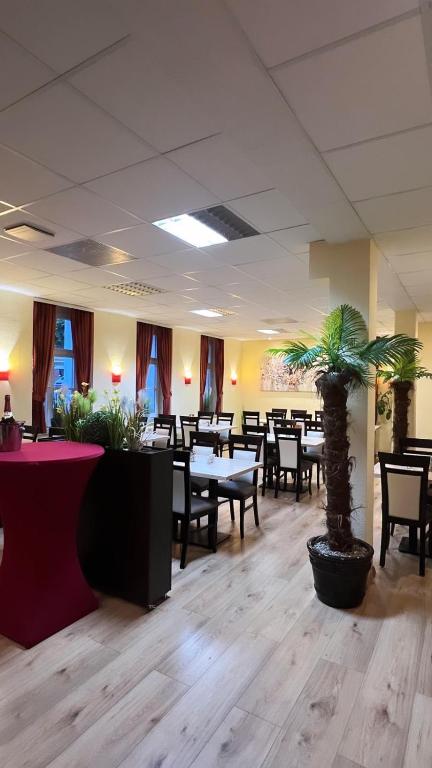 Restaurace v ubytování Hotel Alento im Deutschen Haus Restaurant Olympia
