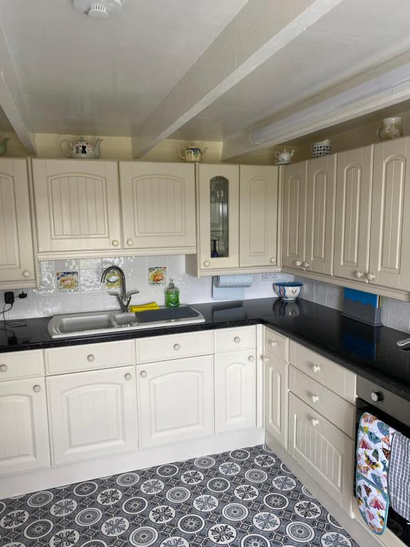 Kuchyň nebo kuchyňský kout v ubytování Cnoc Ruaraidh Cottage