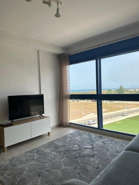 TV a/nebo společenská místnost v ubytování Apartamento duplex Mediterránean view