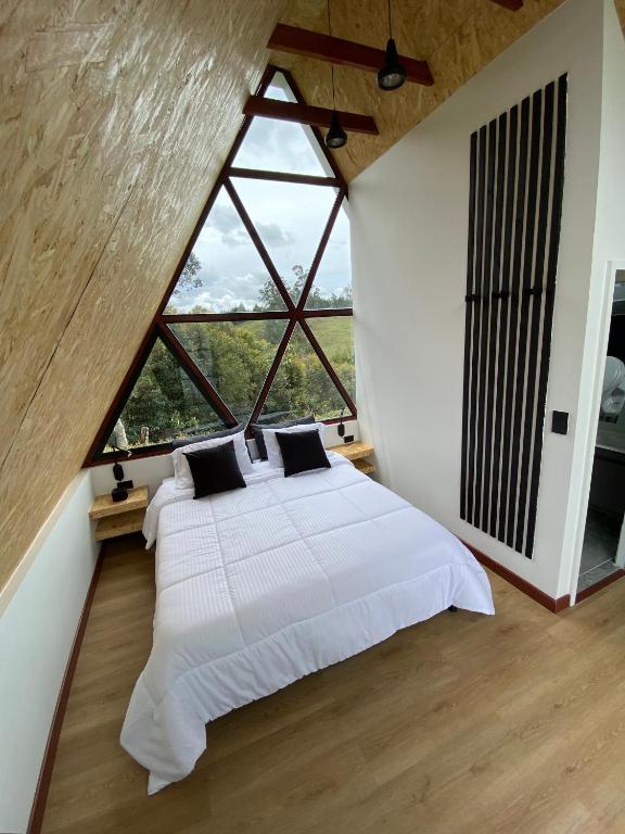 Postel nebo postele na pokoji v ubytování Pietrasanta Home