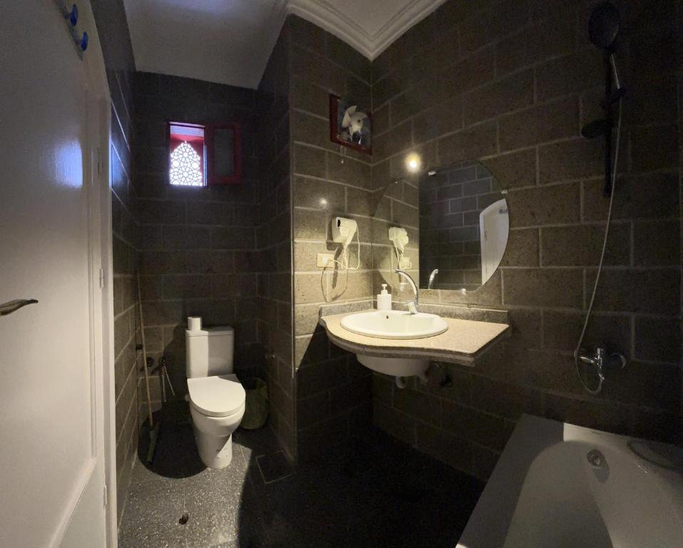 Koupelna v ubytování Ali Baba Hotel