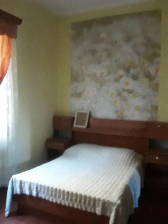 Postel nebo postele na pokoji v ubytování Guest House Buche 219
