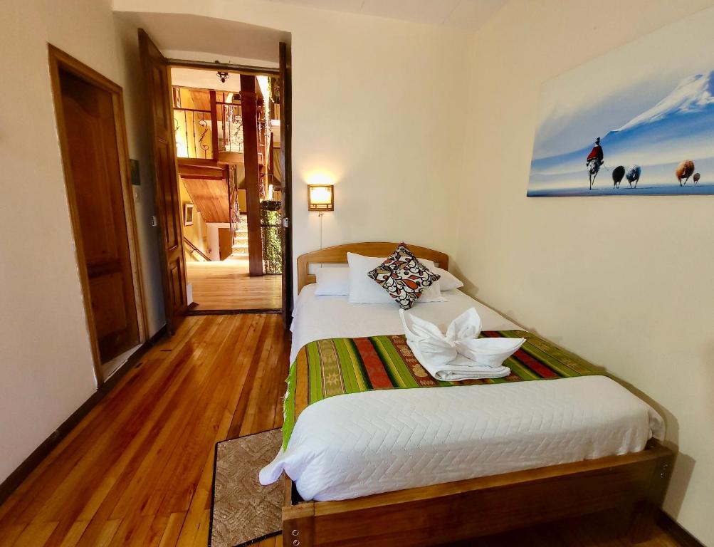 Postel nebo postele na pokoji v ubytování Mía Leticia B&B